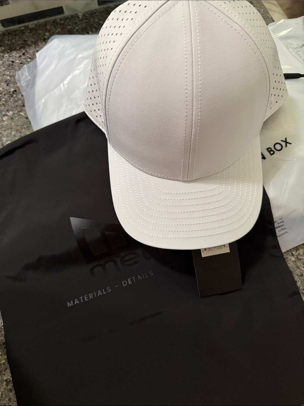 Melin Hydro A Game White Performance Cap 🧢 with hat storage protector cover